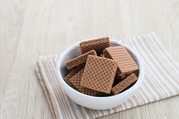 Square wafer biscuits, Crunchy wafers with chocolate cream flavor
