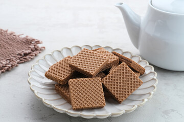 Square wafer biscuits, Crunchy wafers with chocolate cream flavor
