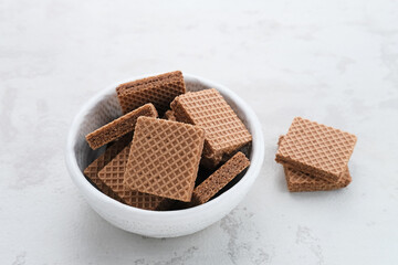 Square wafer biscuits, Crunchy wafers with chocolate cream flavor
