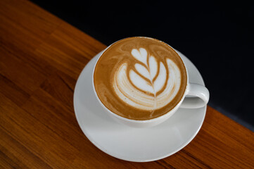 hot latte art coffee on table, relax time
