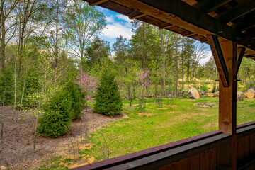 View Out of a Covered Bridge Walk Way Showing The Timber Frame and a View of the Young and Old...
