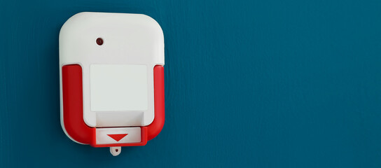 Modern smart home fire alarm installed on wall in room