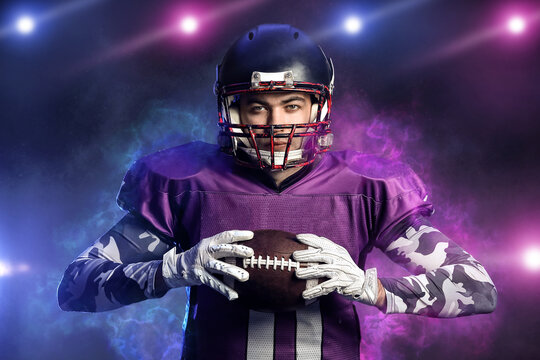 American Football Player On Dark Background