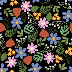 Cute seamless pattern with Isolated colorful flowers on black background. Wild blooms and green leafs. Bright modern fancywork for fashion print fabric design, textiles and wrapping.