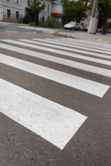 Zebra crosswalk on road in city