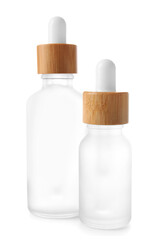 Obraz na płótnie Canvas Two bottles of serum on white background