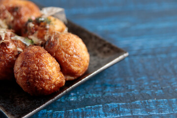 Freshly baked takoyaki on the table