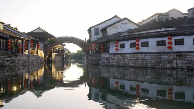 aerial view of old house and old arch stone bridge over river in huzhou nanxun
