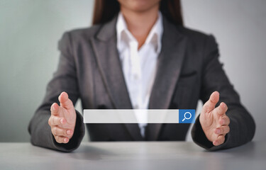 Attractive female hands using laptop computer keyboard searching, browsing internet data online information with search bar console interactive on screen. Lifestyle with technology