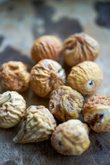 Pile of traditional Chinese medicine ingredients, dried figs close-up