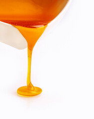 Close up texture of honey dripping.