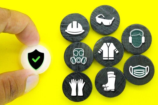 wooden circle with Safety First icon. the concept of safety in industry