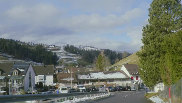 Driver POV driving into Fischenthal, Fistel Switzerland, car POV beautiful sunny day