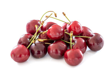 several red cherries isolated on white background
