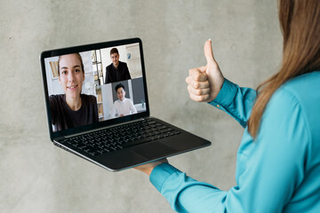 Web conference. Video chat. Professional telecommuting. Satisfied female executive approving...