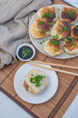 Shanghai pan fried pork dumpling with wild garlic