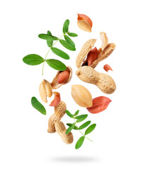 Crushed peanuts with leaves in the air isolated on a white background