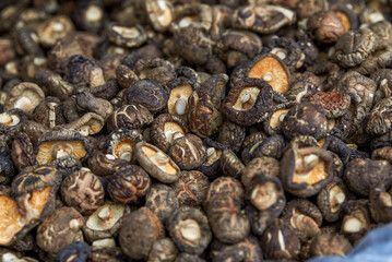 Bunch of fragrant dried shiitake mushrooms close-up