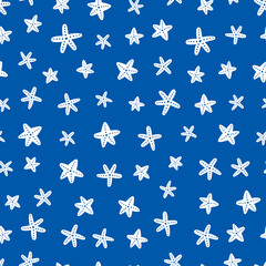 White starfish seamless pattern with blue background.