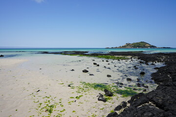 clear shoaling beach and island