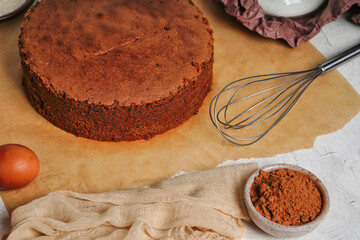 Chocolate sponge cake with copy space or biscuit cake so soft and delicious with ingredients eggs, flour and cacao.