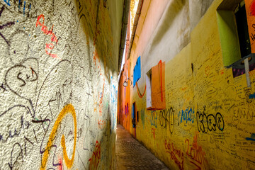 famous narrow colorful road of rope in the south-eastern Transylvania full of written marks