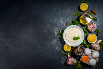 Homemade mayonnaise sauce. Bowl of mayonnaise with fresh ingredients top view copy space - obrazy, fototapety, plakaty