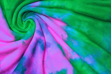 Abstract tie dye neon multicolor folded fabric cloth boho pattern texture for background, sale...
