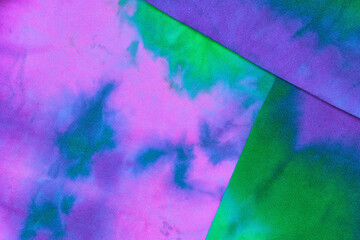 Abstract tie dye neon multicolor folded fabric cloth boho pattern texture for background, sale...