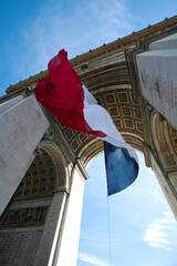 Waving French Flag at Arc de Triomphe