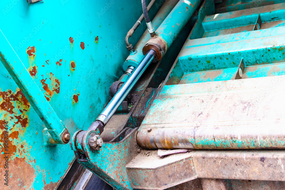 Poster A garbage truck picks up garbage in a residential area. Loading mussar in containers into the car. Separate collection and disposal of garbage. Garbage collection vehicle.