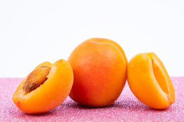 Delicious apricots on a white background