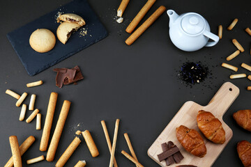 Fototapeta na wymiar breakfast snacks on black background