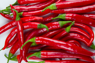 red peppers on a white background