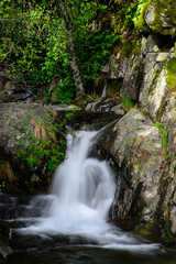 Fototapeta na wymiar waterfall of pure and crystalline water in the rivers of Las Hurdes