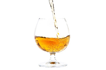 Pouring Cognac or Brand Isolated on White