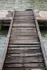 Fototapeta premium Wooden pier into the canal