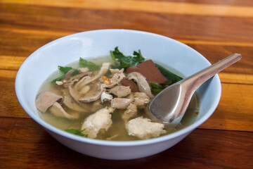 Blood tofu soup with gourd leaves 