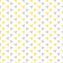 Abstract ornament with grey and yellow triangles on white background. Geometric seamless texture. modern pattern or wallpaper.