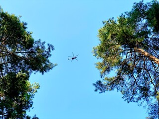 helicopter flies