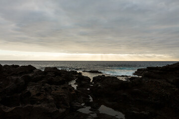 Calm ocean in the morning. ocean shore with stones
