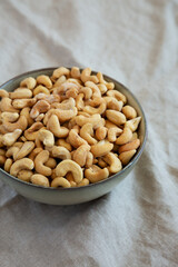 Homemade Roasted and Salted Cashews in a Bowl, side view.