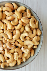 Homemade Roasted and Salted Cashews in a Bowl, top view. Flat lay, overhead, from above.