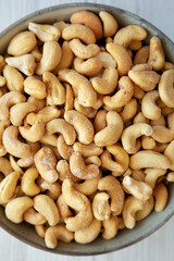 Homemade Roasted and Salted Cashews in a Bowl, top view. Flat lay, overhead, from above.