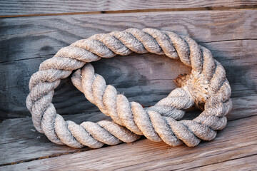 Ancient marine rope on a wooden sailboat