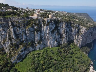 Aerial view of Marina Grande in Capri, an island located in the Tyrrhenian Sea off the Sorrento Peninsula, on the south side of the Gulf of Naples in the Campania region of Italy. Drone view of Capri.