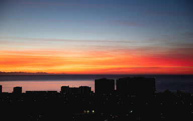 Sunrise over coastal town, Mossel Bay