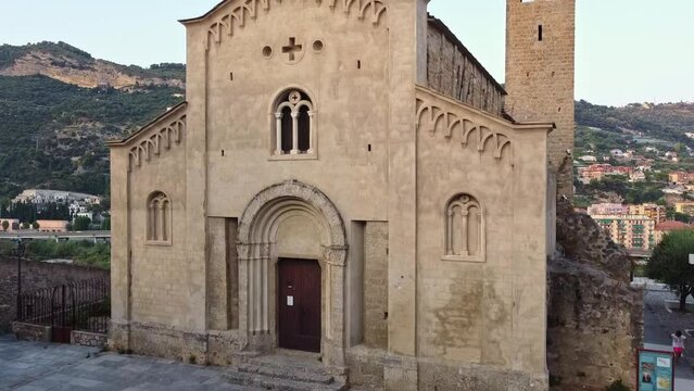 Aerial drone shot of a view of the church of San Michele Arcangelo in the medieval old town of Ventimiglia in Italy, Liguria, Italy. Beautiful panoramic aerial view from flying unmanned aerial vehicle