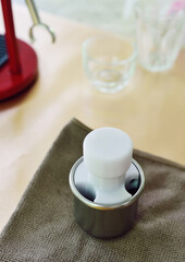 Press the coffee powder in the scoop firmly