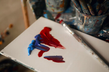 oil paints and brushes on the palette